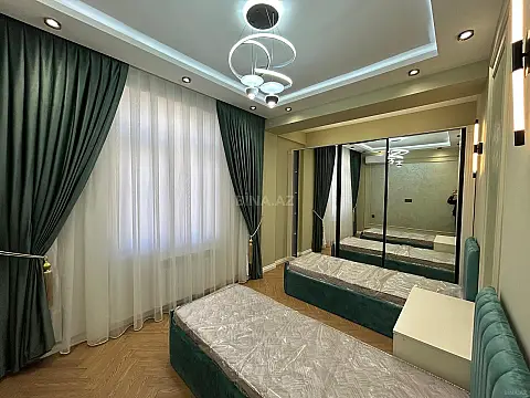 Satılır 4 otaqlı mənzil 137 m²