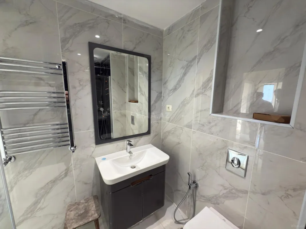 Satılır 2 otaqlı mənzil 63 m²