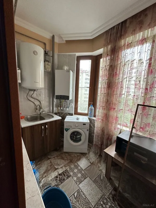 Satılır 4 otaqlı mənzil 163 m²