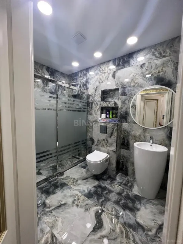 Satılır 4 otaqlı mənzil 148 m²