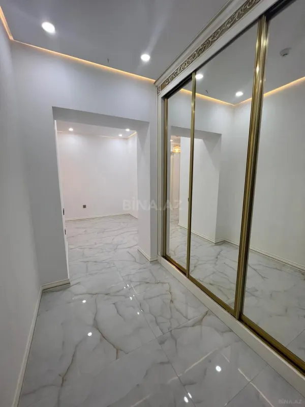 Satılır 4 otaqlı mənzil 148 m²