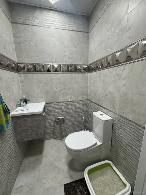 Satılır 4 otaqlı mənzil 158.7 m²