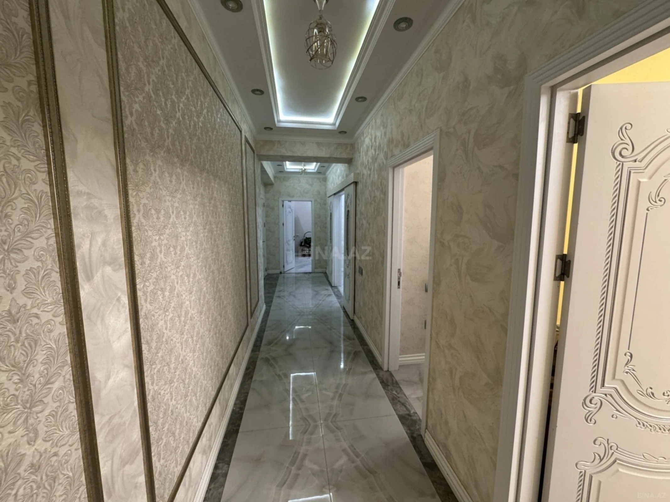 Satılır 4 otaqlı mənzil 158.7 m²