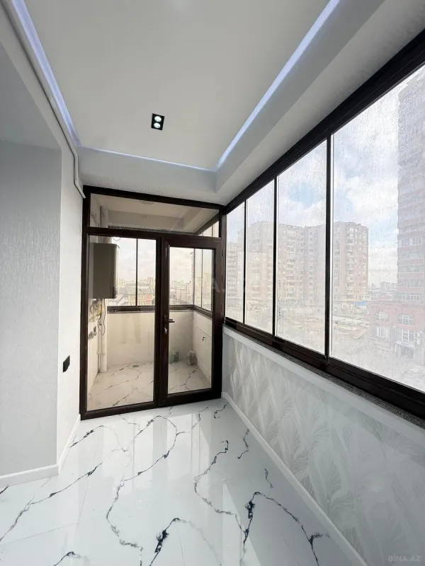 Satılır 4 otaqlı mənzil 144 m²