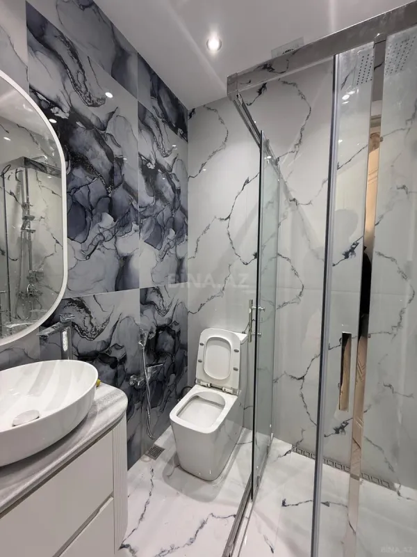 Satılır 4 otaqlı mənzil 144 m²