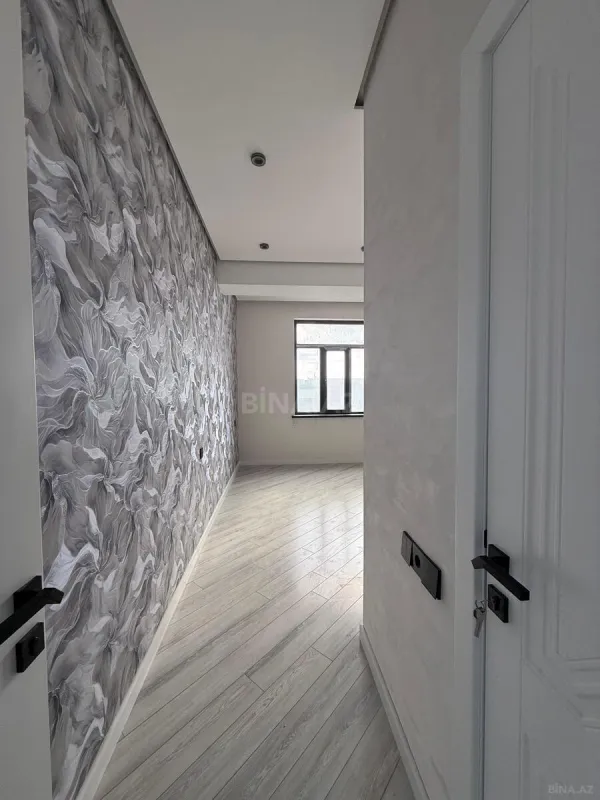 Satılır 4 otaqlı mənzil 144 m²