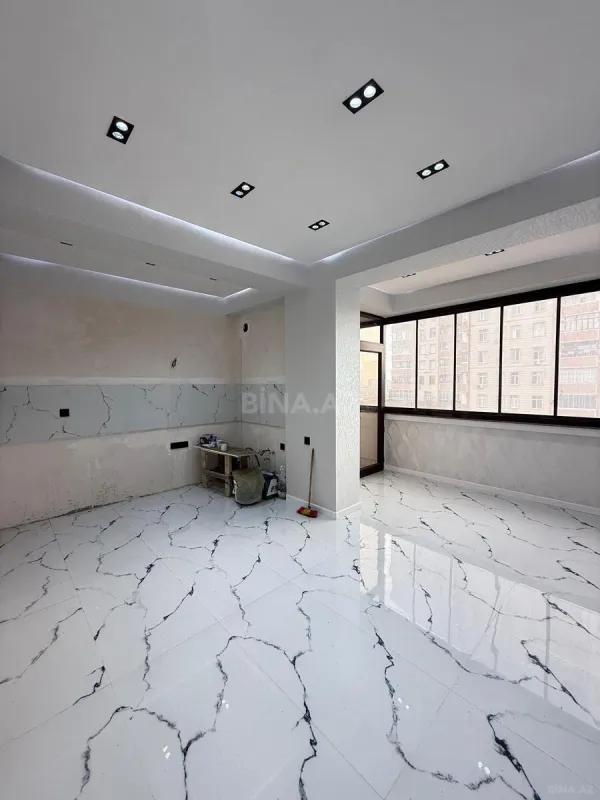 Satılır 4 otaqlı mənzil 144 m²