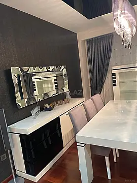 Satılır 4 otaqlı mənzil 202 m²