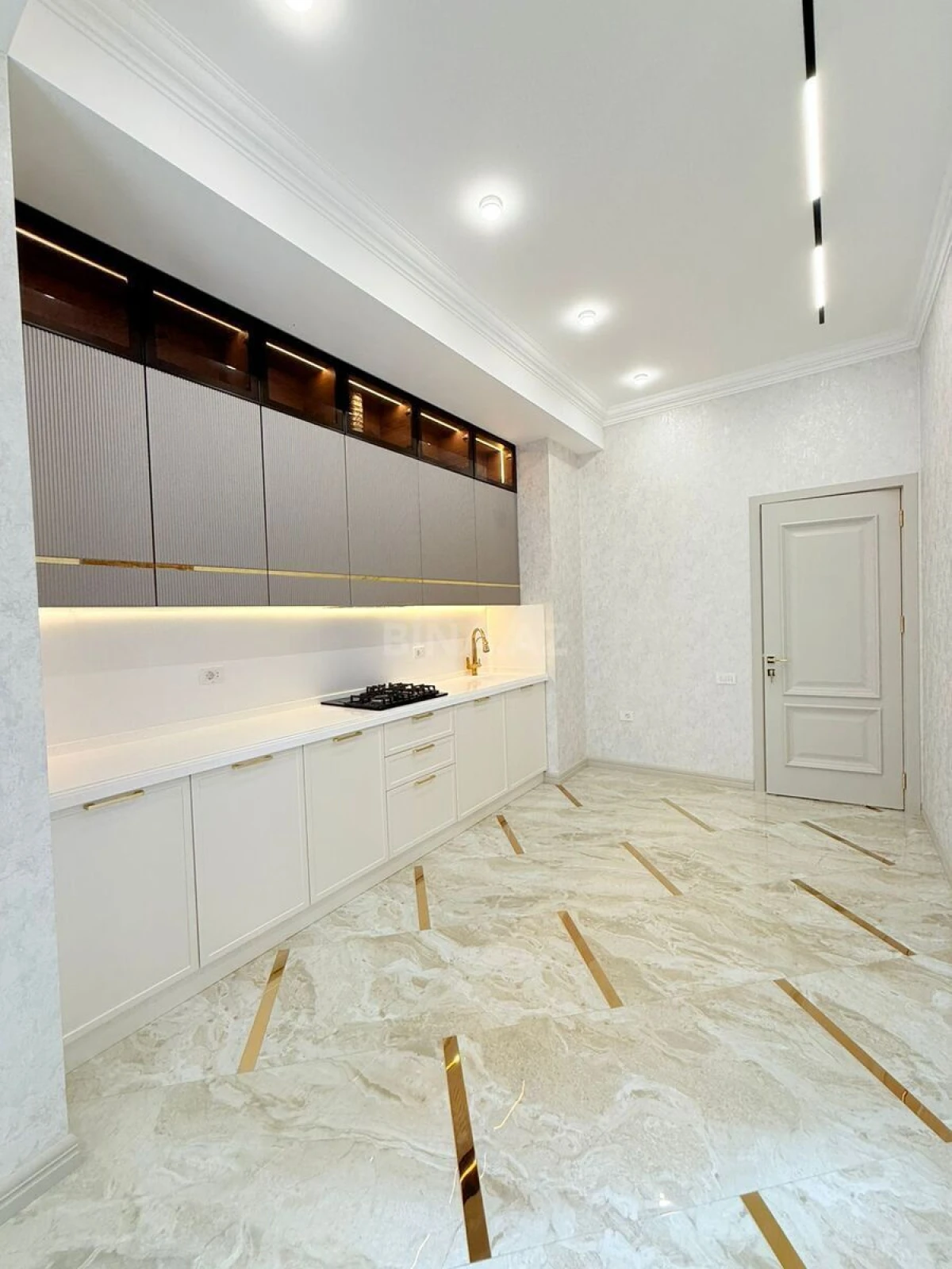 Satılır 4 otaqlı mənzil 165 m²
