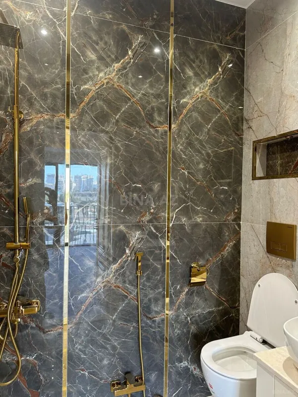 Satılır 4 otaqlı mənzil 127 m²