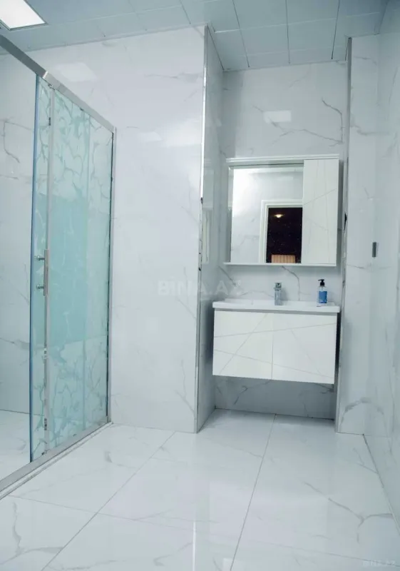 Satılır 4 otaqlı mənzil 131 m²