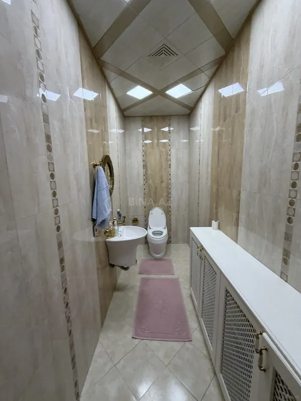 Satılır 4 otaqlı mənzil 174 m²