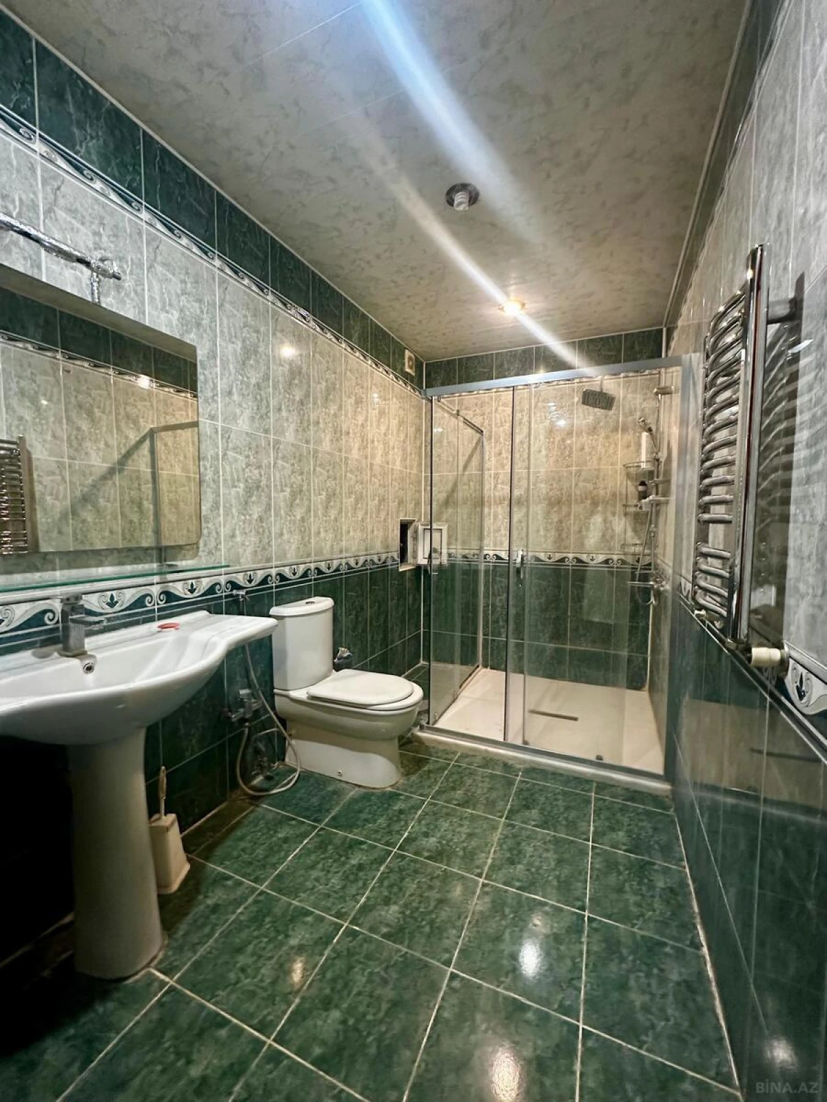 Satılır 4 otaqlı mənzil 210 m²