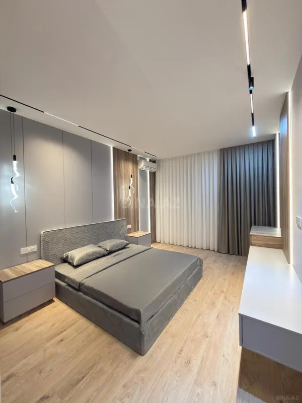 Satılır 4 otaqlı mənzil 141 m²