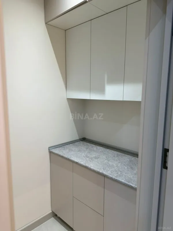 Satılır 4 otaqlı mənzil 132 m²