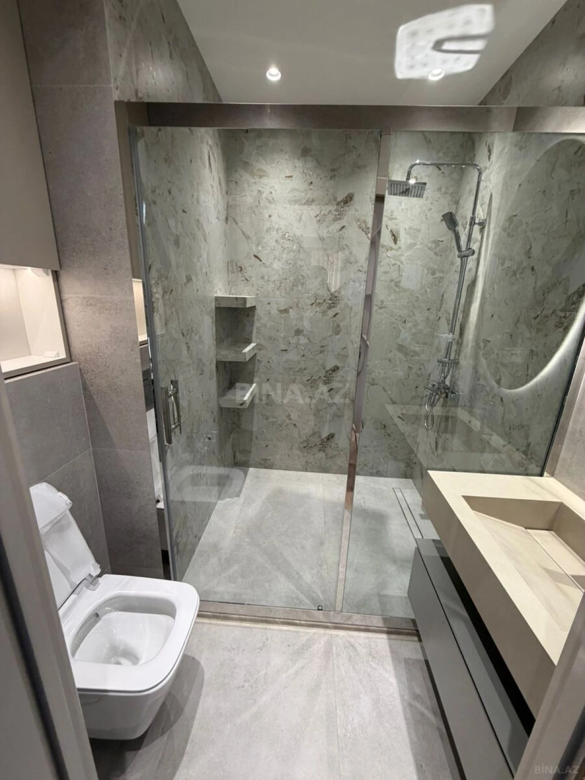 Satılır 4 otaqlı mənzil 132 m²