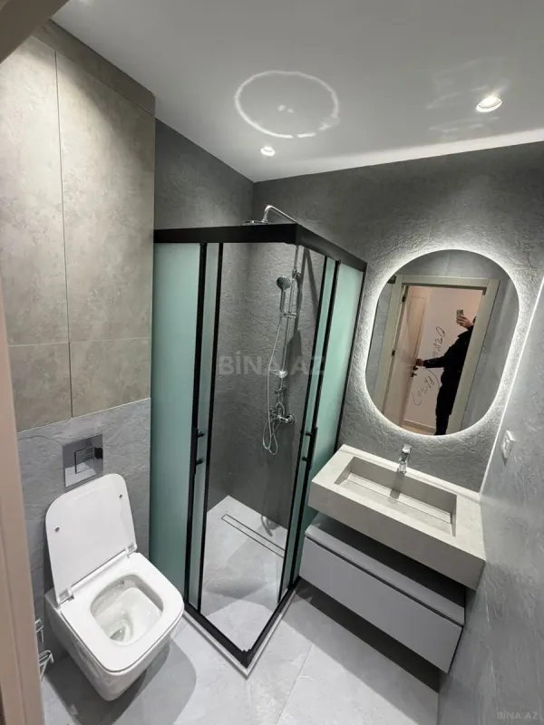 Satılır 4 otaqlı mənzil 132 m²