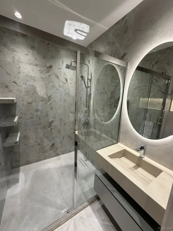 Satılır 4 otaqlı mənzil 132 m²