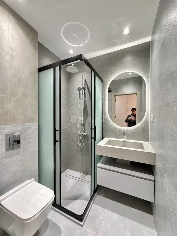 Satılır 4 otaqlı mənzil 141 m²