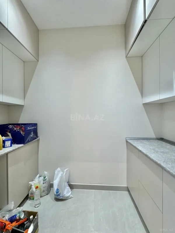 Satılır 4 otaqlı mənzil 141 m²