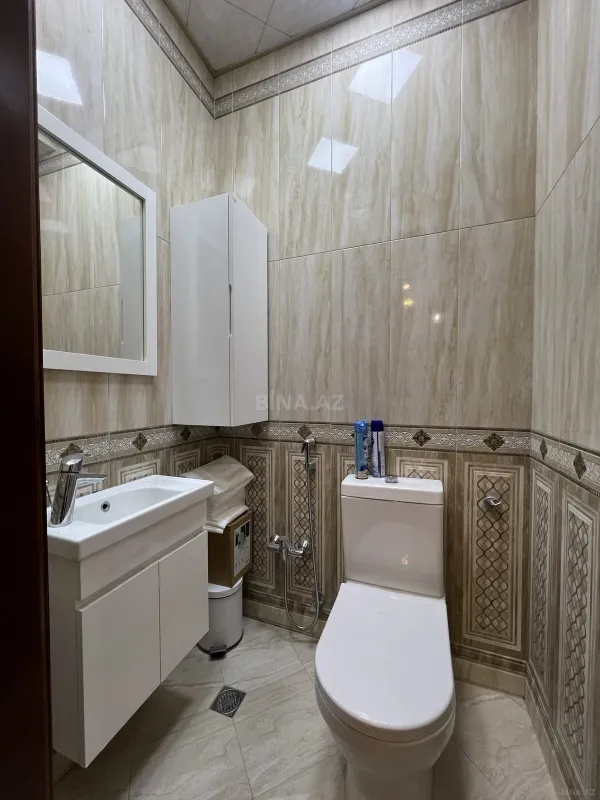Satılır 4 otaqlı mənzil 165 m²