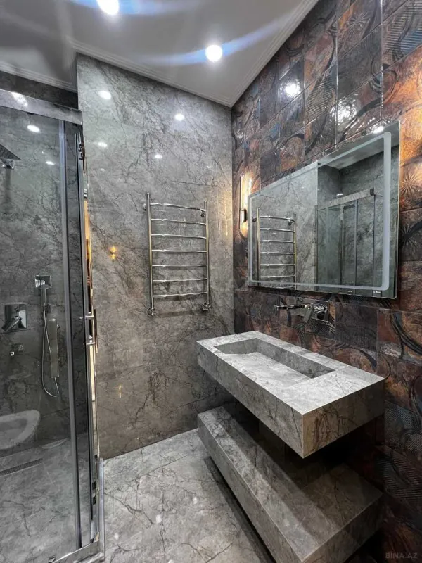 Satılır 3 otaqlı mənzil 128 m²