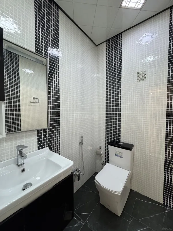 Satılır 4 otaqlı mənzil 154 m²