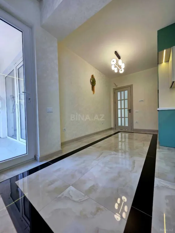 Satılır 3 otaqlı mənzil 128 m²