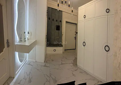 Satılır 4 otaqlı mənzil 165 m²