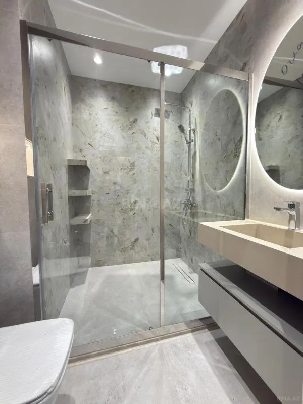 Satılır 4 otaqlı mənzil 145 m²