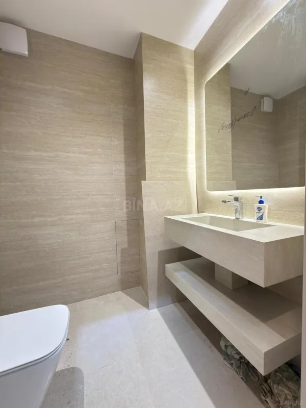 Satılır 4 otaqlı mənzil 145 m²