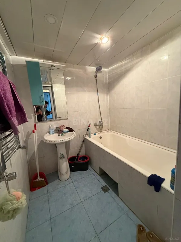 Satılır 4 otaqlı mənzil 141 m²