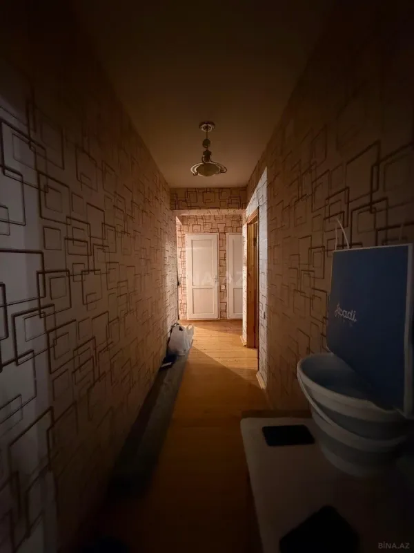 Satılır 4 otaqlı mənzil 141 m²