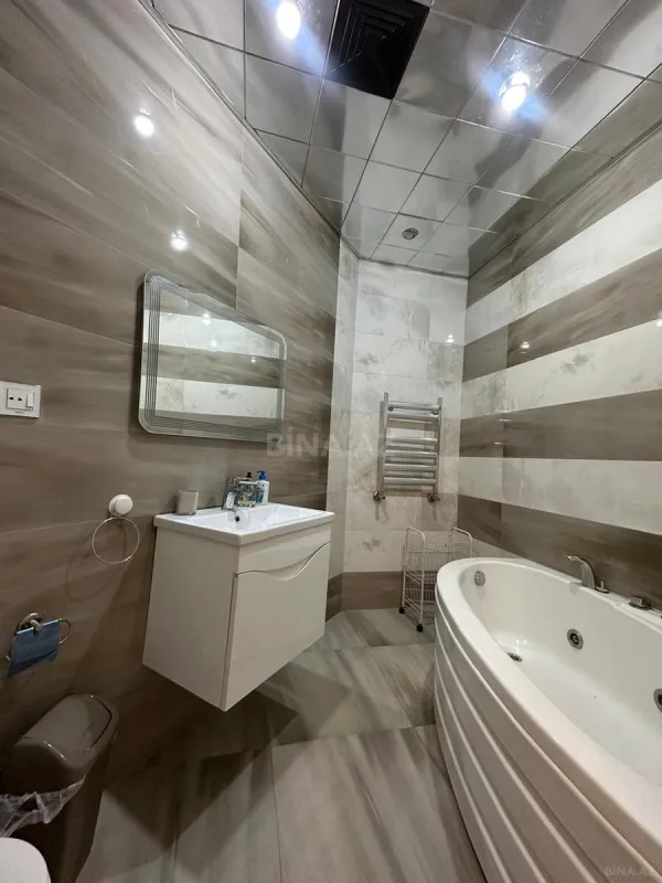 Satılır 4 otaqlı mənzil 184 m²