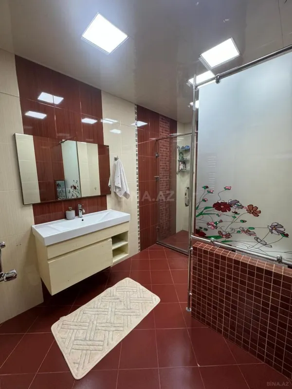 Satılır 4 otaqlı mənzil 230 m²
