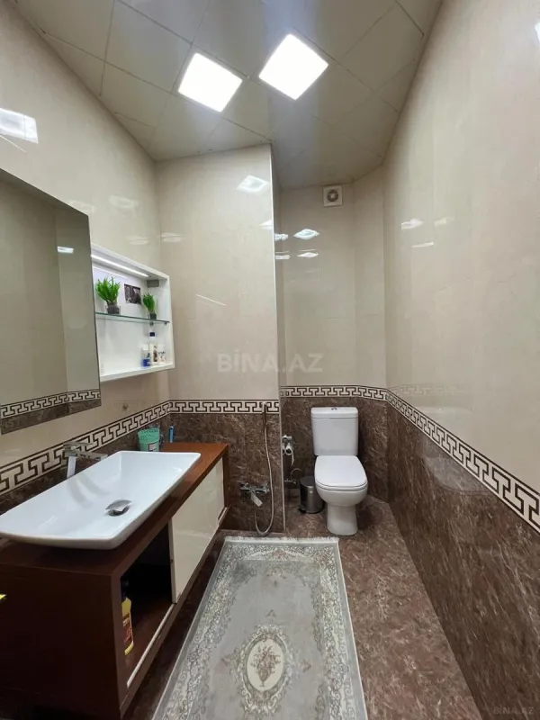 Satılır 4 otaqlı mənzil 165 m²