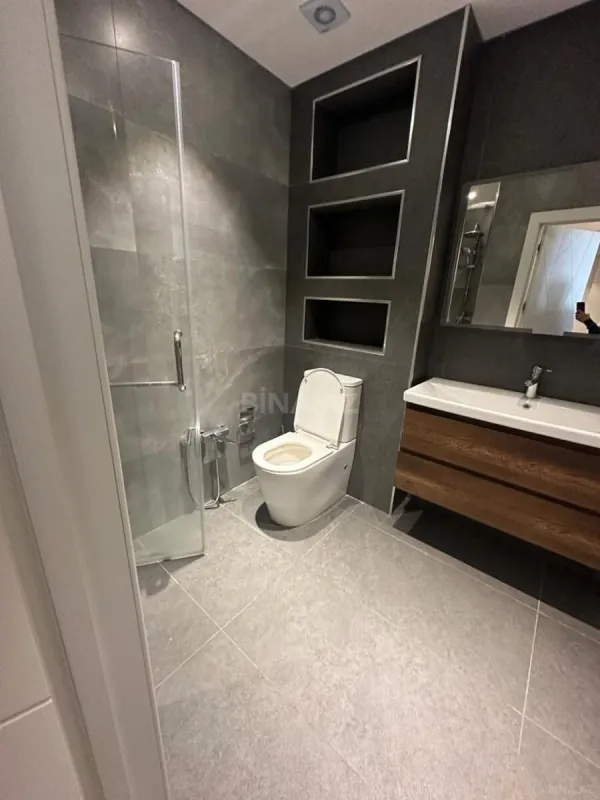 Satılır 2 otaqlı mənzil 103.4 m²