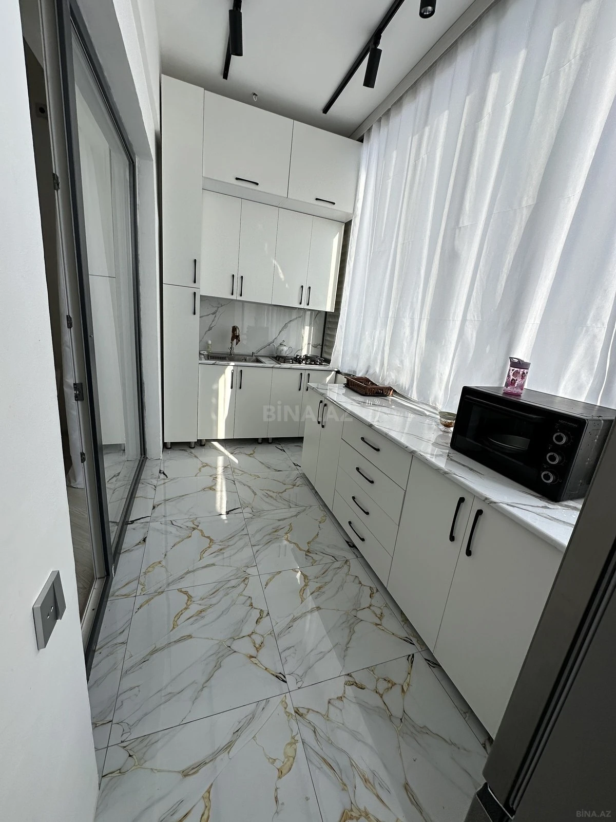 Satılır 2 otaqlı mənzil 73 m²