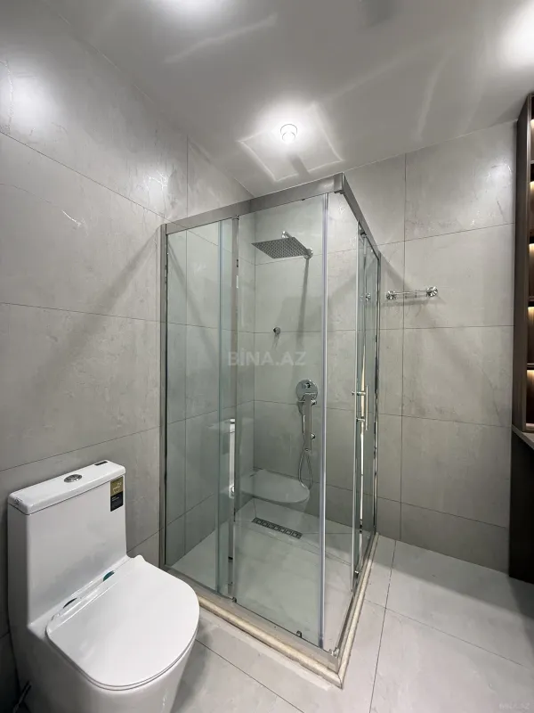 Satılır 4 otaqlı mənzil 140 m²