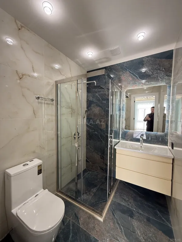 Satılır 4 otaqlı mənzil 140 m²