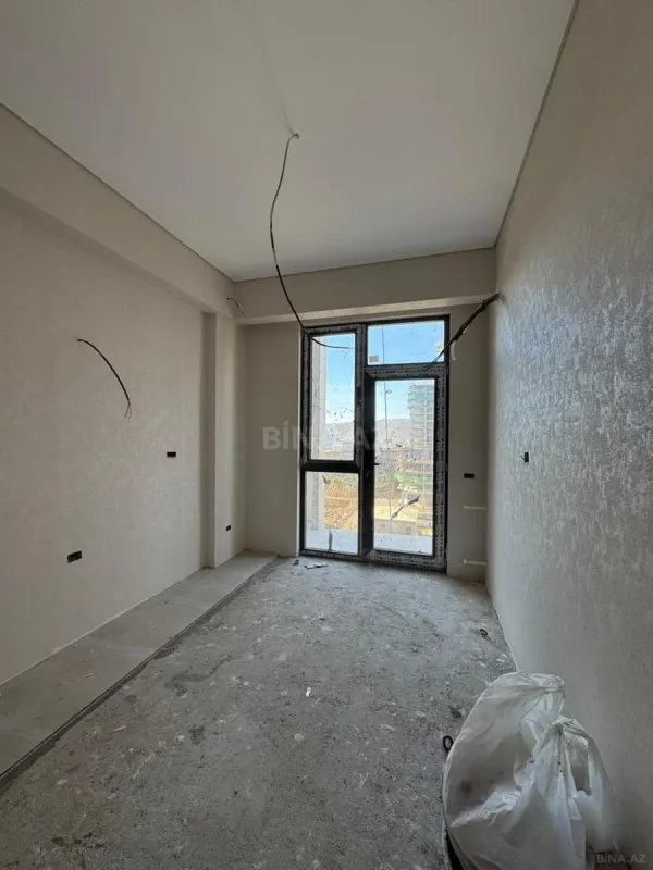 Satılır 2 otaqlı mənzil 55.6 m²