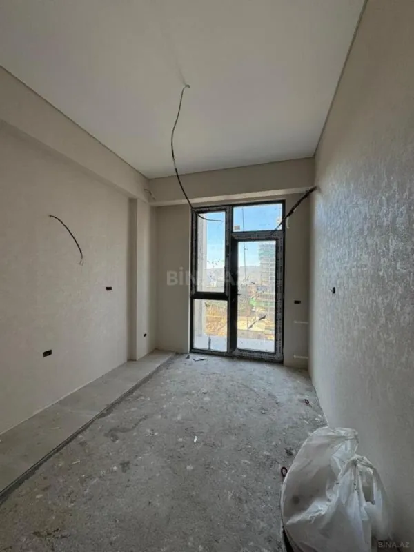Satılır 2 otaqlı mənzil 55.6 m²