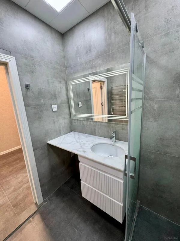 Satılır 2 otaqlı mənzil 60.7 m²