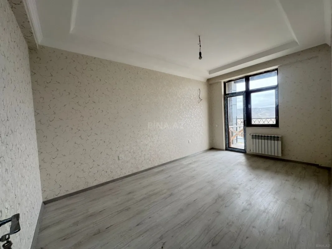 Satılır 4 otaqlı mənzil 118 m²