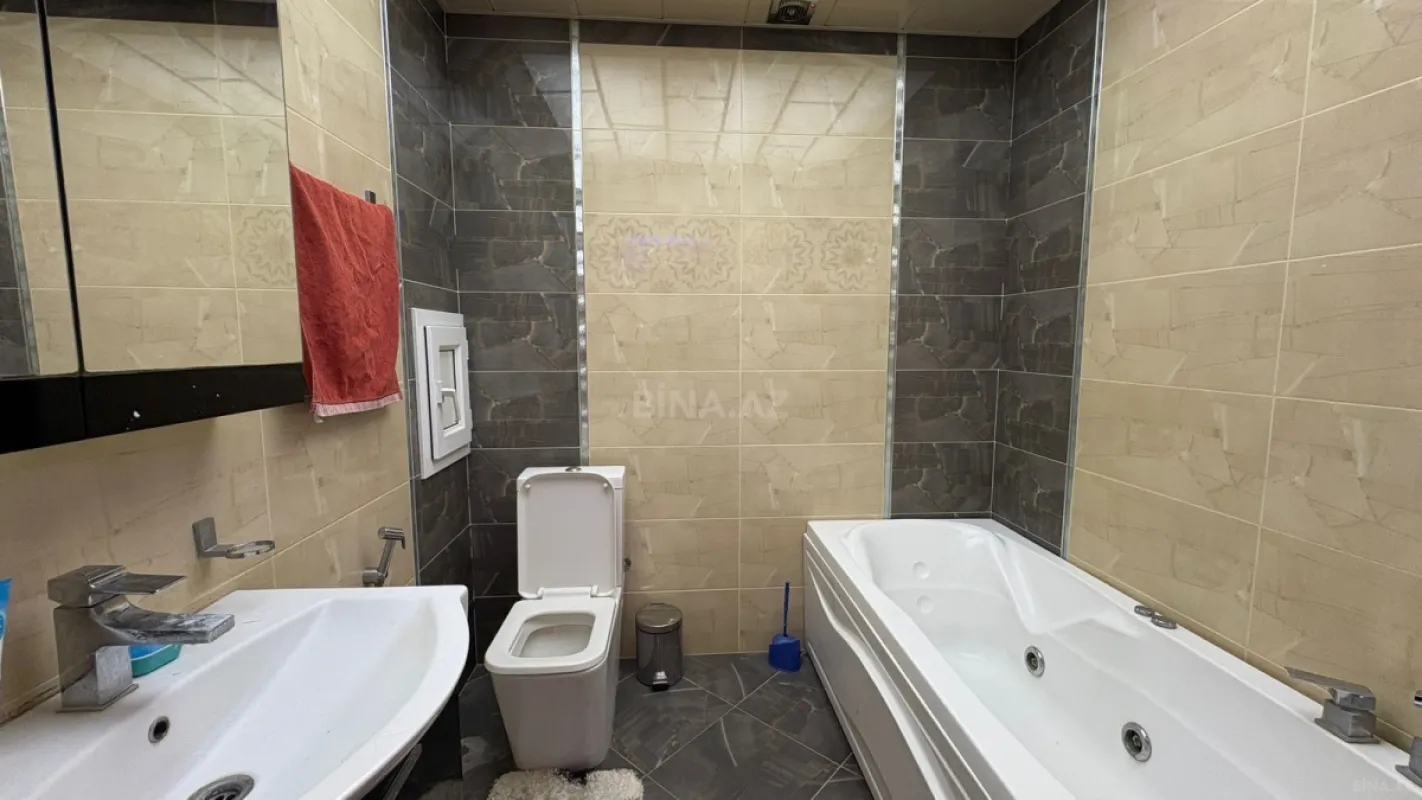 Satılır 4 otaqlı mənzil 167 m²
