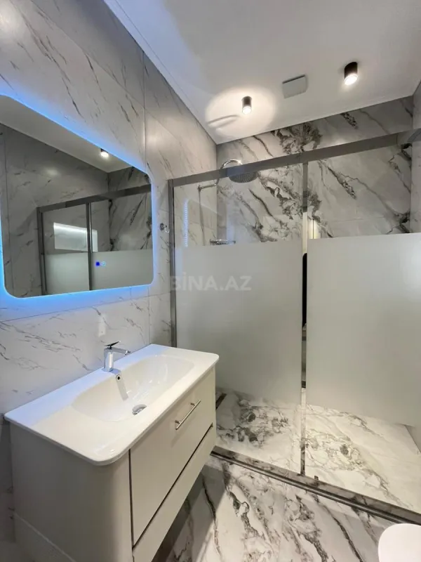 Satılır 4 otaqlı mənzil 118 m²