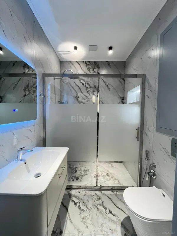 Satılır 4 otaqlı mənzil 118 m²