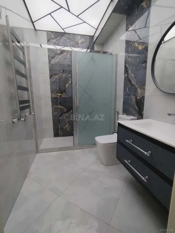 Satılır 4 otaqlı mənzil 170 m²