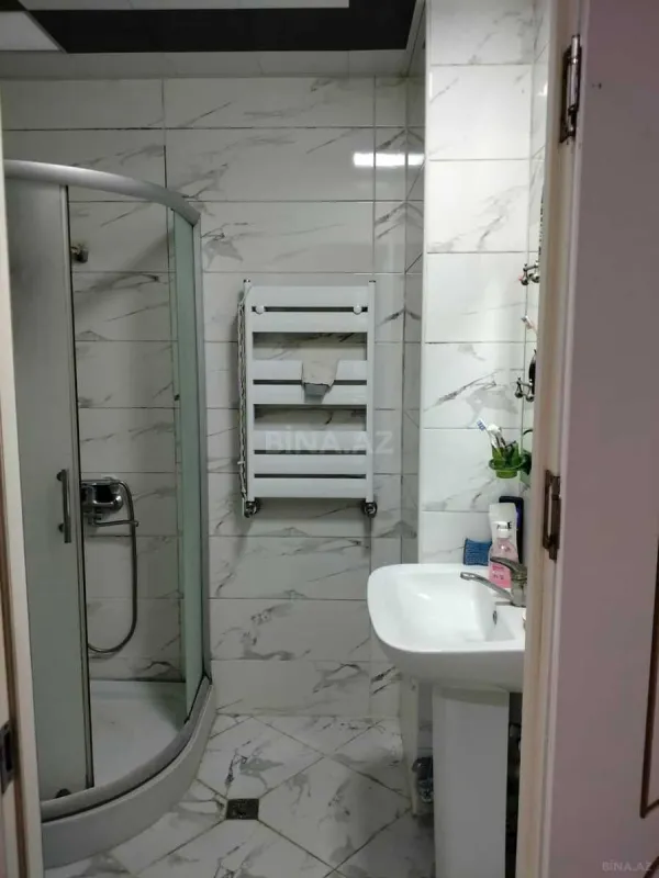Satılır 4 otaqlı mənzil 140 m²