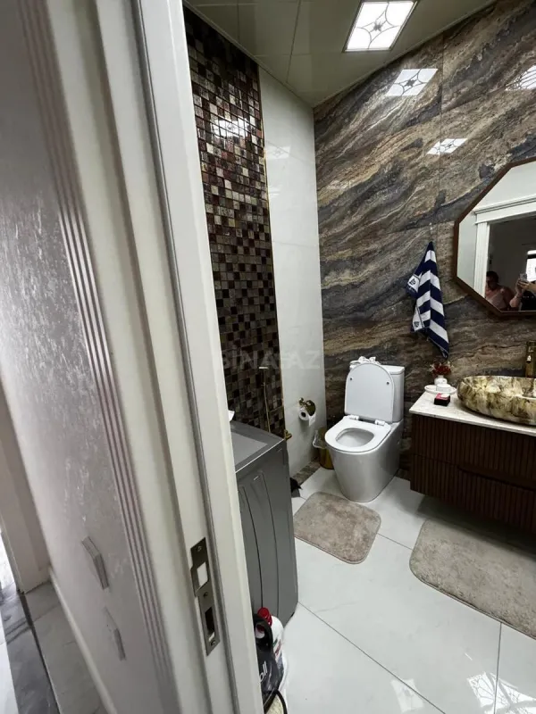 Satılır 3 otaqlı mənzil 148 m²